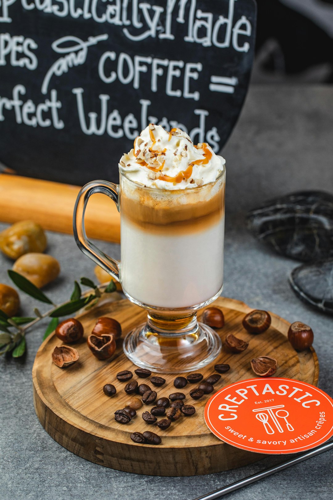 clear-glass-mug-with-brown-liquid-on-brown-wooden-tray-w6dn-pytscw